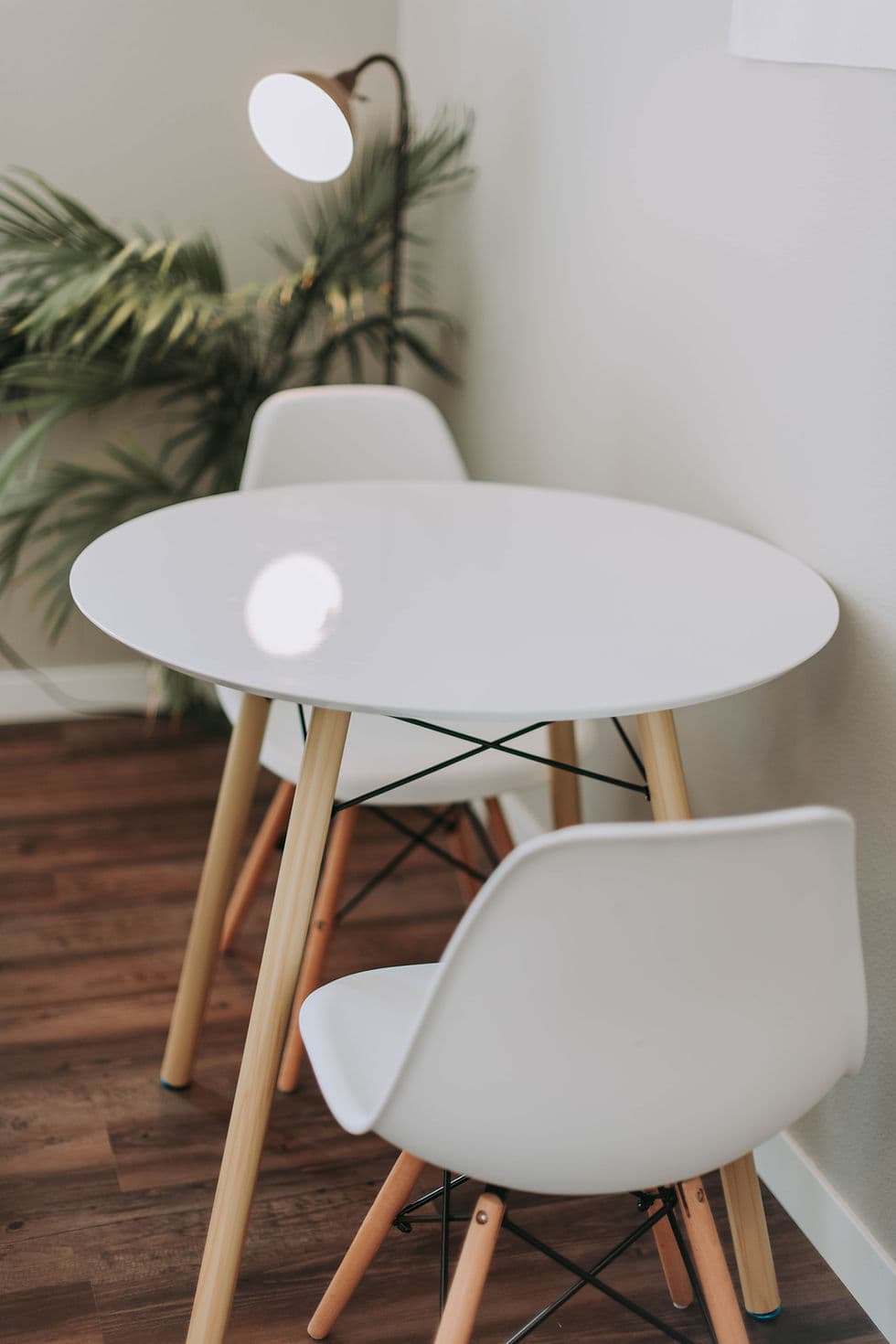 Modern white dining table and chairs — about Hope Furniture Ministry